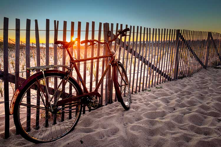 bike on the beach at sunset in Provincetown, MA