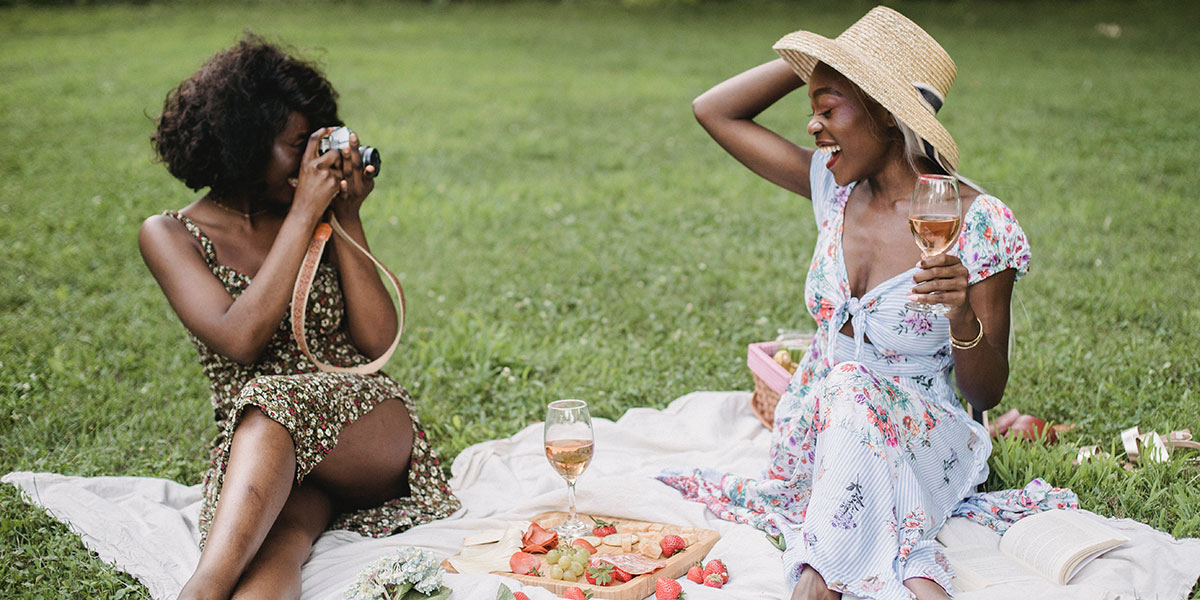 Two ladies enjoying a picnic