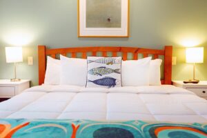 Bed with Fish pillow in Laurel Room