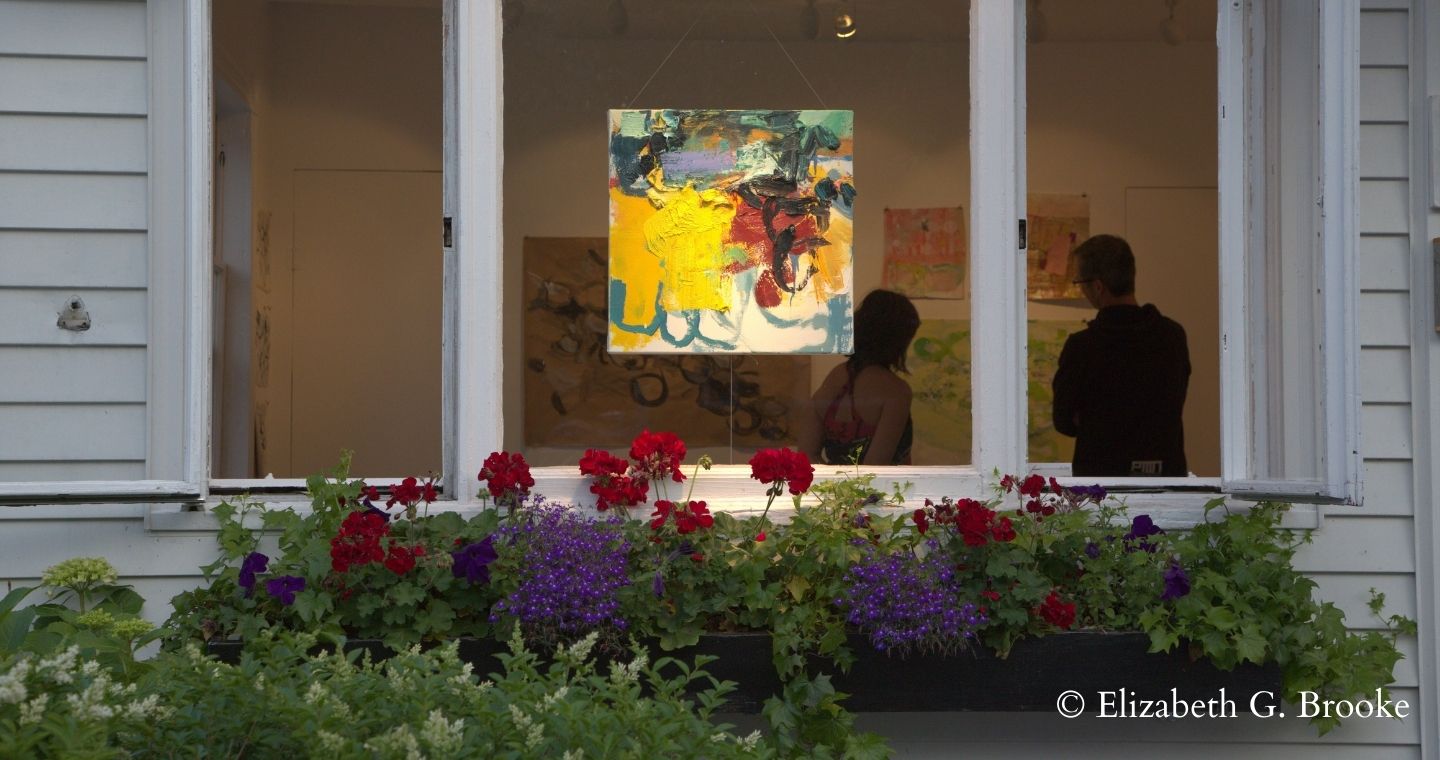 Looking inside the window of a Provincetown art gallery