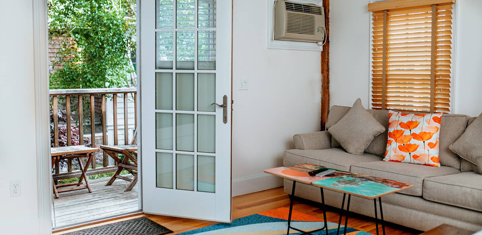 Living room with door to balcony at our lodging room Olivia
