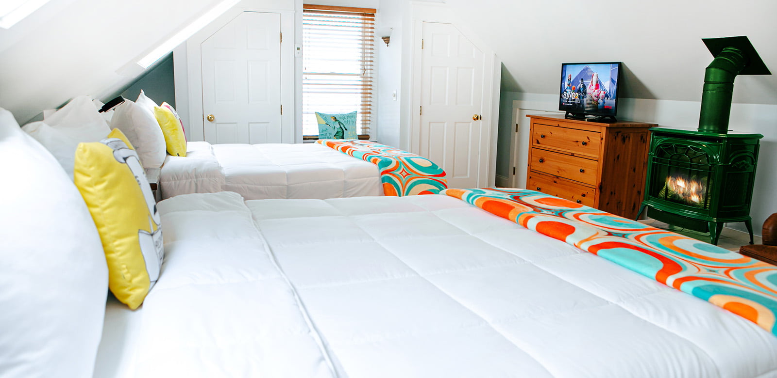 Agatha Christie with two queen size beds with TV and fireplace