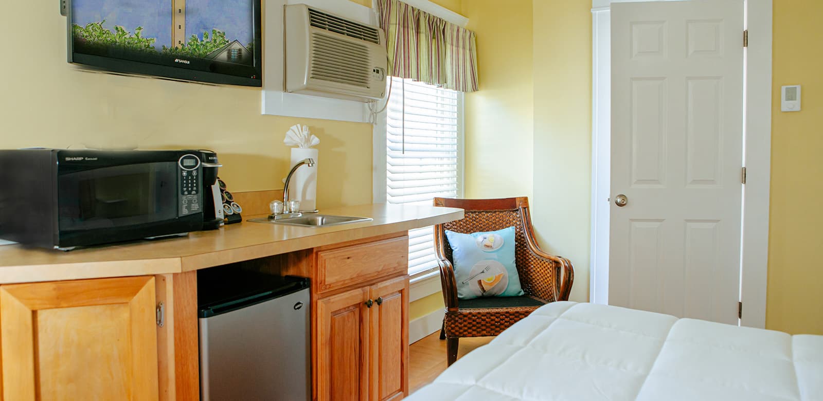 Wet bar with mini-fridge and microwave at Virginia Woolf