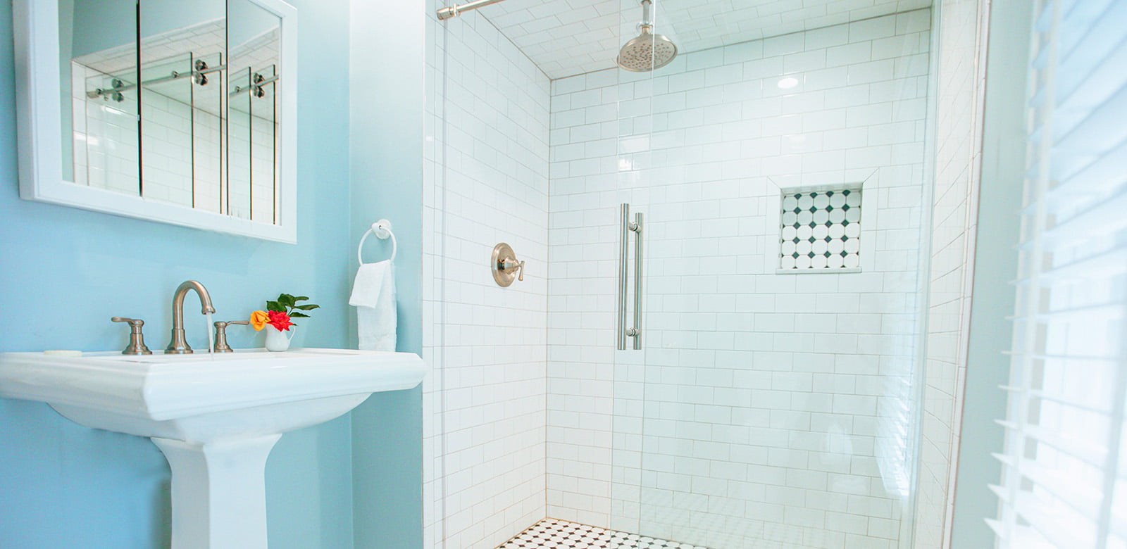Bathroom with walk-in shower and sink at Agatha Christie
