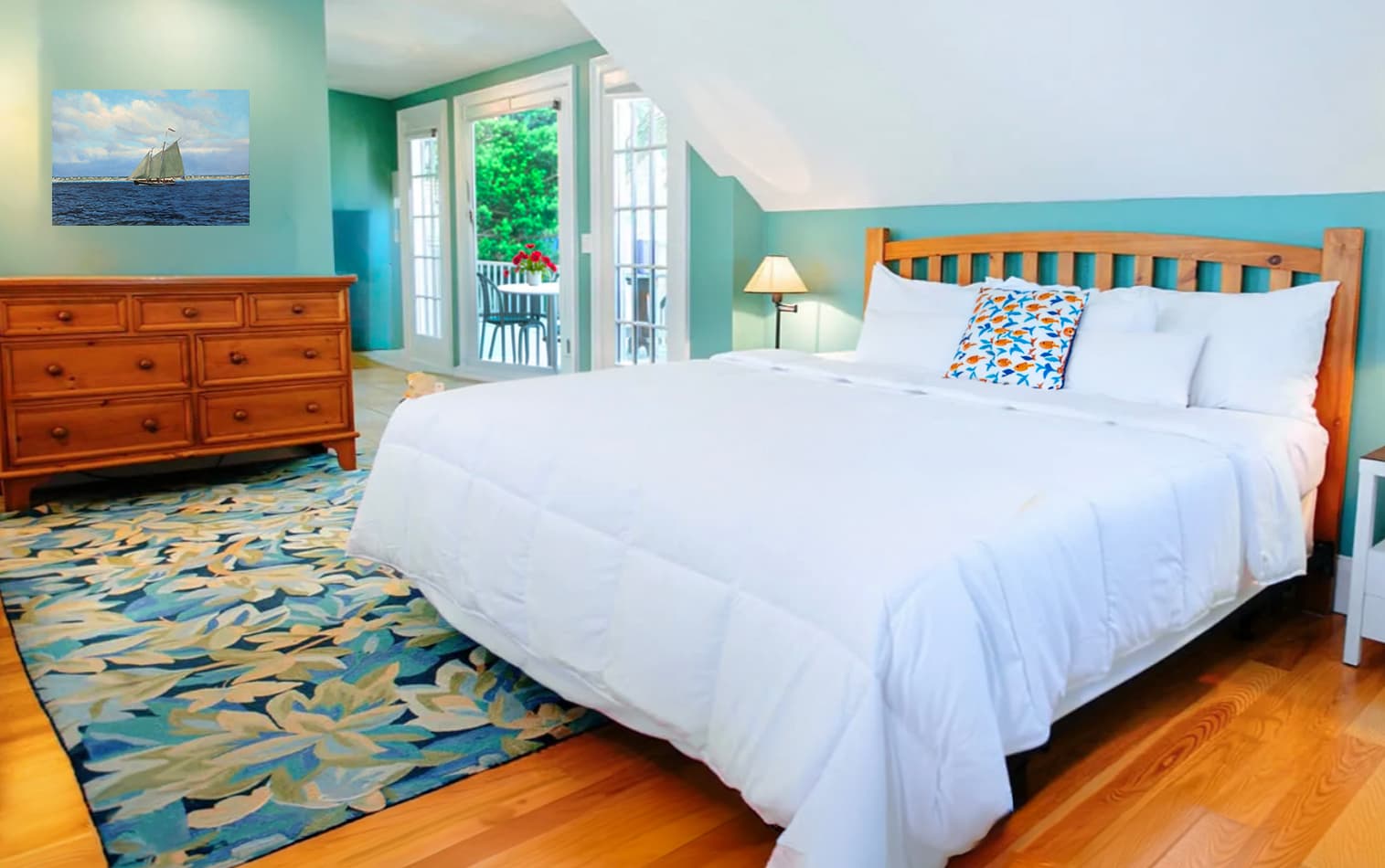 Ariel Penthouse King bedroom with private deck at Gabriel's, a Provincetown Hotel